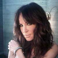 Robin Antin wears Loren Jewels